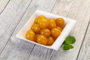 Yellow ripe cherry dessert photo