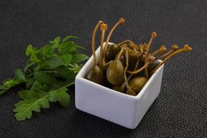 Pickled Capersberries in the bowl photo