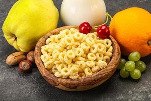 Breakfast with corn rings and milk photo