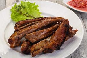 Roasted pork ribs photo