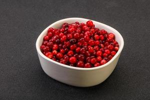 Sweet and tasty cranberry in the bowl photo