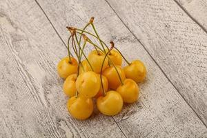 Sweet ripe yellow cherry heap photo