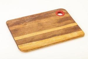 tabla de madera para cortar en el kinchen foto