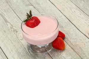 Yoghurt with strawberry in the bowl photo