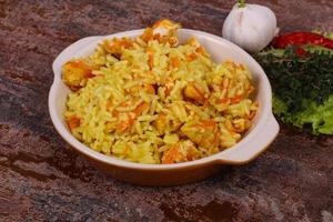 Traditional Pilaf with chicken and carrot photo