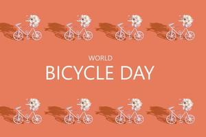 Decorative bicycles with flowers and text World Bicycle day on orange background photo