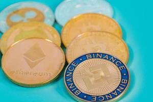 Binance Coin BNB group included with Crypto currency coin Dogecoin DOGE, bitcoin BTC, Ethereum ETH, Stellar XLM symbol Virtual blockchain technology future is money close up and Macro concept. photo