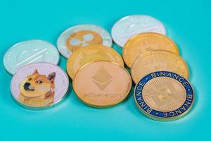 Binance Coin BNB group included with Crypto currency coin Dogecoin DOGE, bitcoin BTC, Ethereum ETH, Stellar XLM symbol Virtual blockchain technology future is money close up and Macro concept. photo