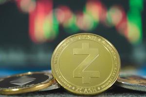 Focus select and blur Golden Zcash ZEC and Ethereum ETH group cryptocurrency symbol and stock chart candlestick on tablets. Use technology cryptocurrency blockchain. with Capital Gain, Fundamental. photo
