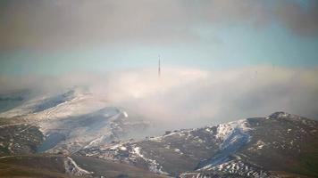 8K Mist Cloud Flowing Down Ridge of Mountain Range video