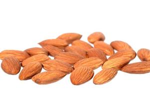 Tasty almonds nuts isolated on white background photo