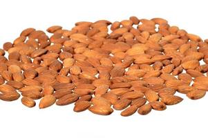 Tasty almonds nuts isolated on white background photo