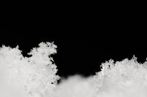 fused snow and black background photo