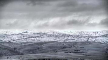 8K Thin Layer Of Snow On Treeless Hills In Winter video