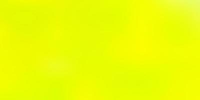 Light green, yellow vector abstract blur pattern.