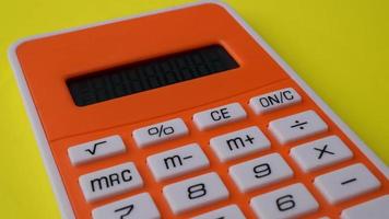 Product shot of orange calculator video