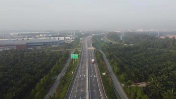 Aerial view highway PLUS of oil palm tree video