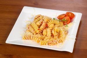 Italian springs pasta with tomato sauce photo