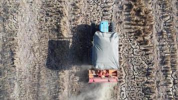 Tractor plowing in farm video