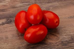 Red bright tasty tomato heap photo