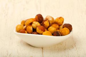 Hazelnut heap in bowl photo