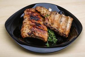 Roasted pork ribs photo