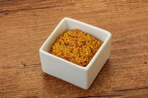 Dijon mustard sauce with seeds photo