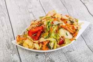 Pickled cabbage salad with herbs photo
