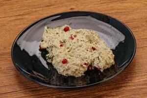 Vagan dietary cusine - mutabal with granet seeds photo