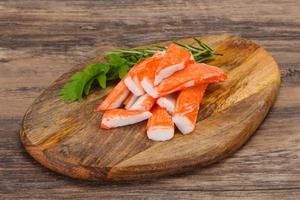 Crab stick surimi over board photo