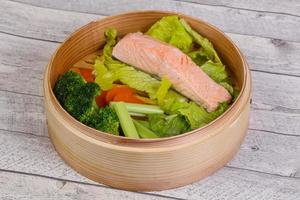 Steamed salmon with vegetables photo