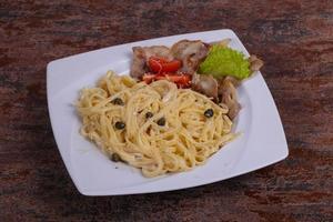 Pasta carbonara with bacon photo