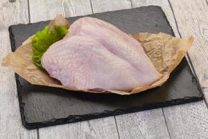 Raw chicken breast photo