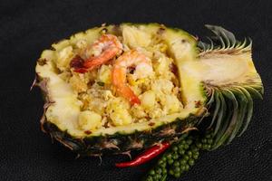 Fried rice with pineapple and prawns photo