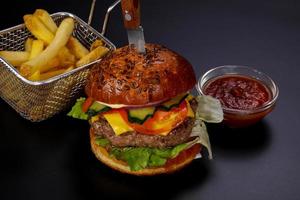 Hot tasty and juicy burger photo