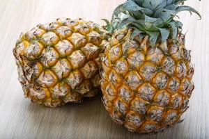 Two small pineapples photo