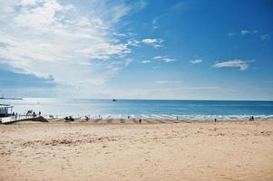 Sunny Beach on Black Sea in Bulgaria. Summer vacation travel holiday. Sunbeds. photo