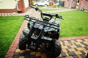 Four-wheller ATV quad bike in home use. photo