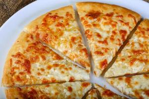 Cheese bread on plate photo