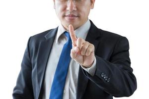 hombre de negocios apuntando con la mano en el foco de fondo blanco en el dedo con la ruta de recorte para el concepto foto