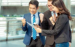 Business man and businesswomen over blurred city background, Success and Happiness Team Concept photo