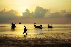 beautiful sunset at beach of koh tao most popular traveling destination in southern of thailand photo