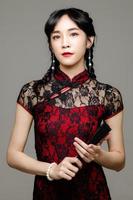 Beautiful Asian woman in cheongsam photo