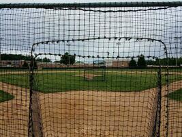 baseball diamond with safety nets photo