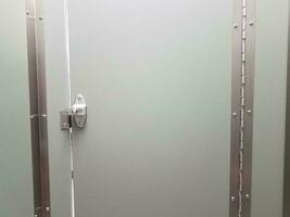 locked or latched bathroom or restroom stall door photo