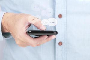 Businessman using her digital smartphone , Social network sharing and commenting in the online community concept photo