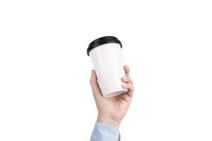 Male hand holding a white coffee cup isolated on white background photo