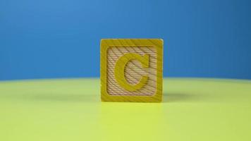 Close up shot letter C alphabet wooden block video