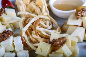 Cheese board on plate photo