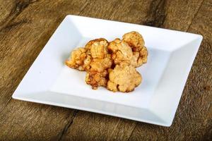 Baked cauliflower on plate photo